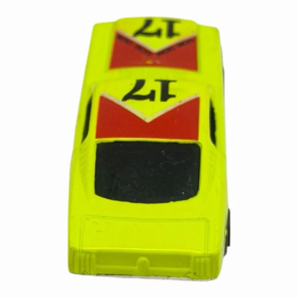 Vintage Yellow Diecast Toy Car with Racing Decals‎